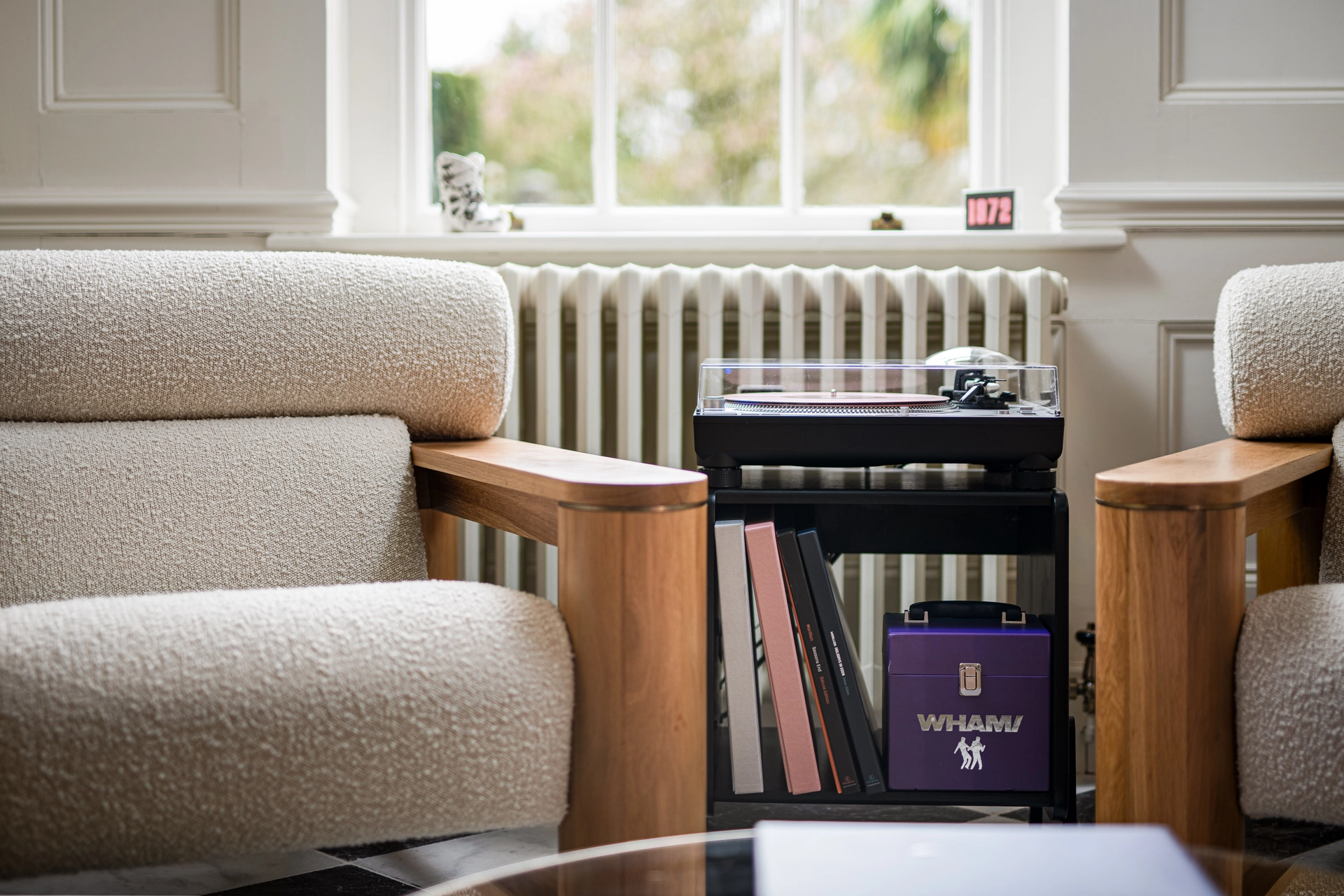 image shows a technics turntable in a room